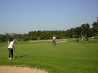 Son Servera putting at hole 9,couple from bavaria